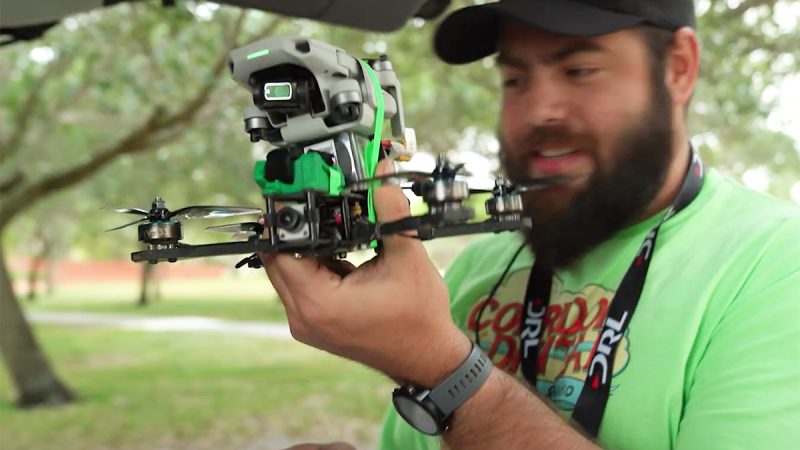NurkFPV et le Mini 2 de DJI fixé sur un racer