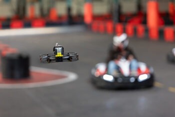 art company droner vs kart 2 01